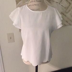 White top with flounce sleeves